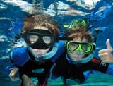 Children snorkelling on Great Barrier Reef